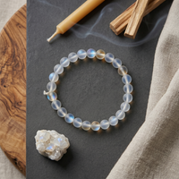 Aura Quartz Crystal Bracelet on wrist – Crown Chakra | Soulolith