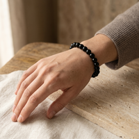 Close-up Black Obsidian Crystal Bracelet – polished volcanic glass beads | Soulolith