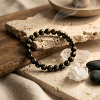 Black Om Mani Bracelet on wrist – Root and Crown Chakra | Soulolith